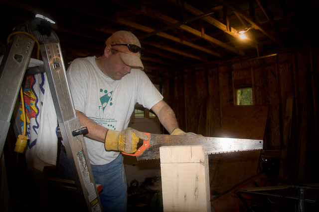 Building the entire structure up in the garage before moving it into place.