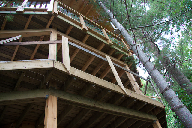 The roof begins to take shape but there are plenty more trusses to go.